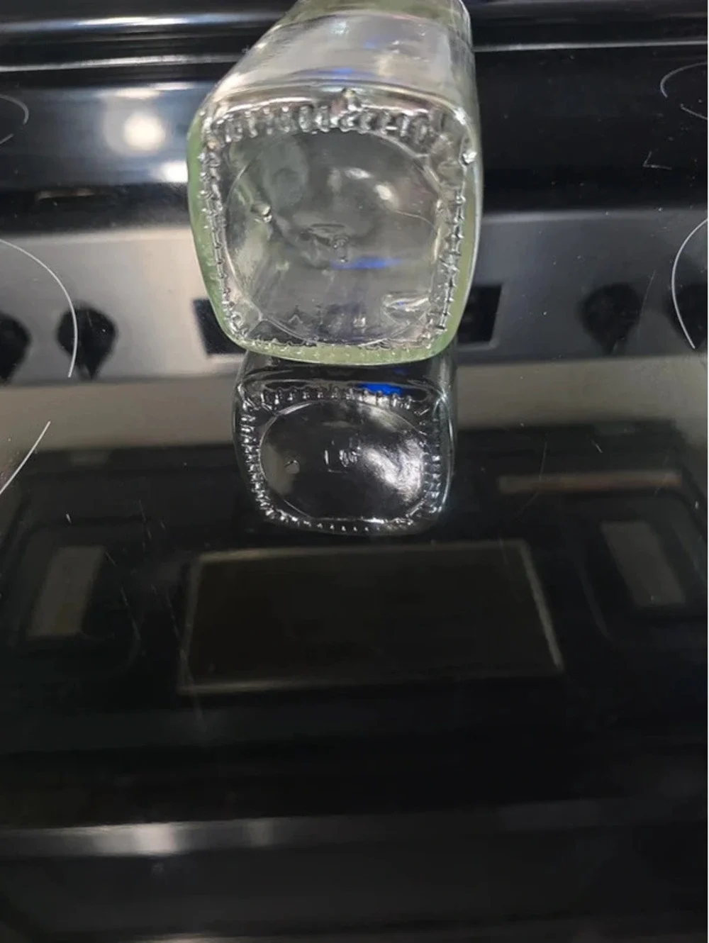Clear Glass Bottle with Swing-Top Cap